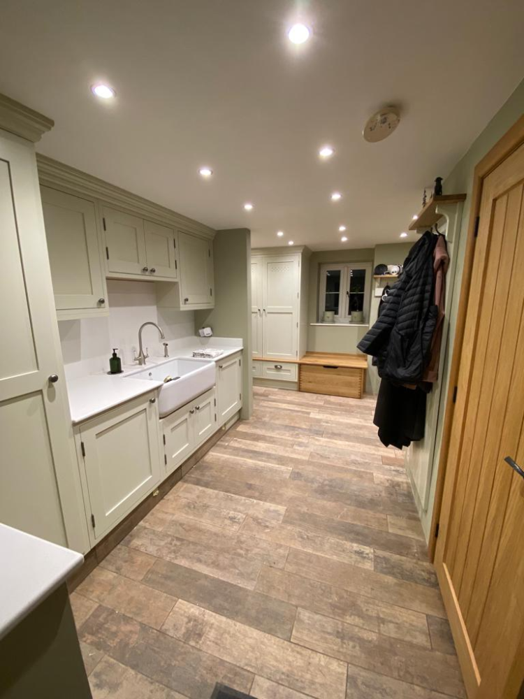 In frame boot room with quartz tops and solid oak bench seats