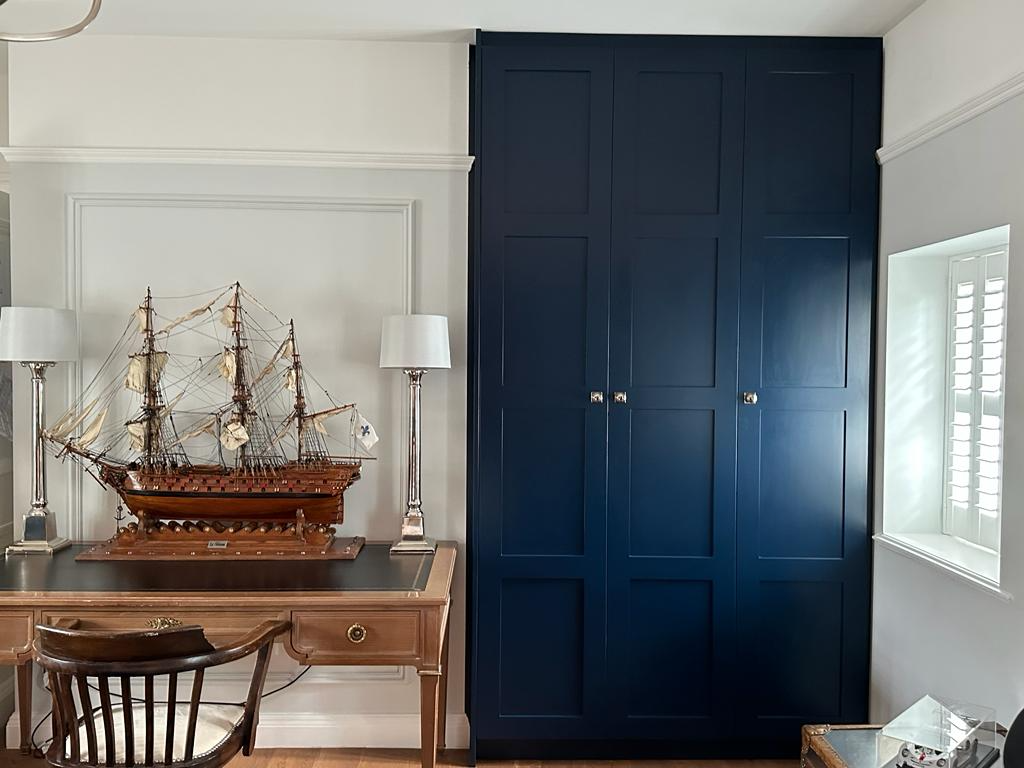 Traditional tall shaker fitted wardrobes with deep blue spray finished